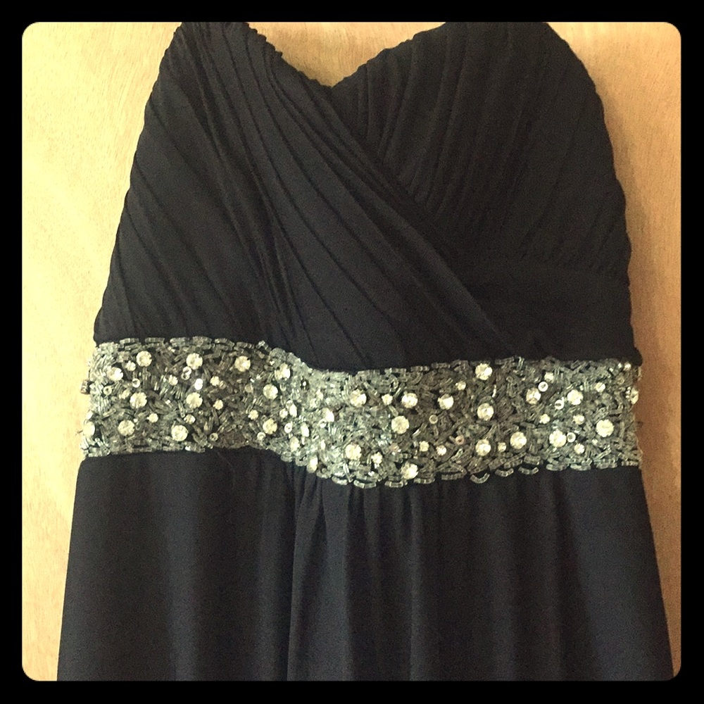 Sequined strapless black dress